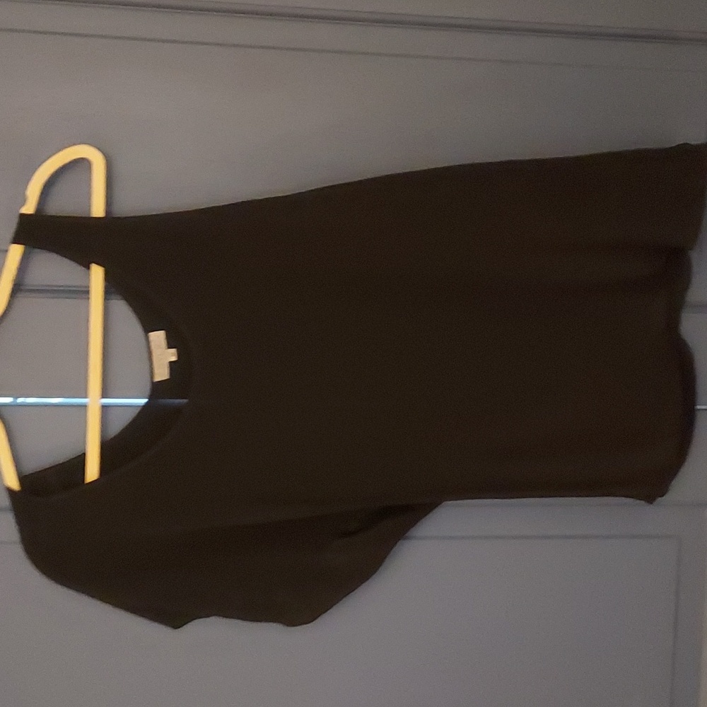 100% silk blouse size medium asymmetrical one tank sleeve one short sleeve black